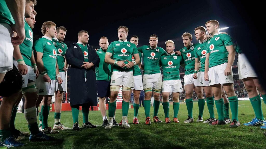 Ireland’s Jamie Heaslip talks to his team mates after the second test. Photograph: Billy Stickland/Inpho