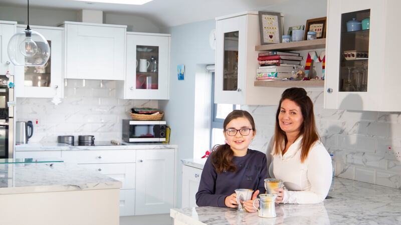 Gráinne Deacon with daughter Aoife (11) in the kitchen. Photograph: Patrick Browne