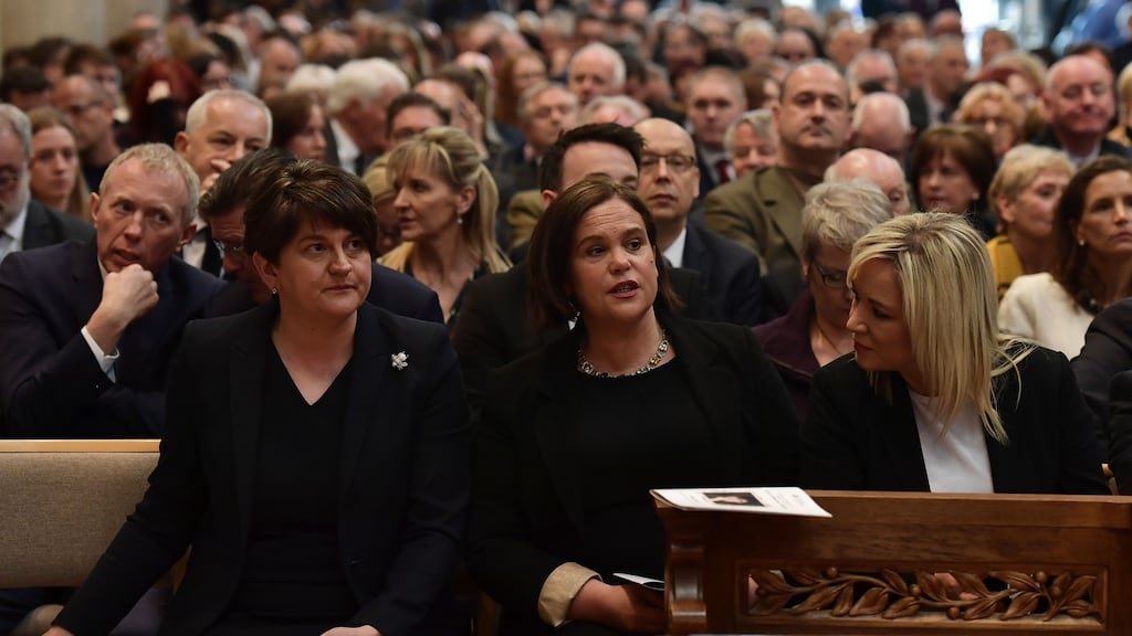 DUP leader Arlene Foster and Sinn Fein party leader Mary Lou McDonald and Sinn Fein deputy leader Michelle O’Neill attend the funeral service of journalist Lyra McKee. Photograph: Charles McQuillan / POOL / AFP/Getty Images