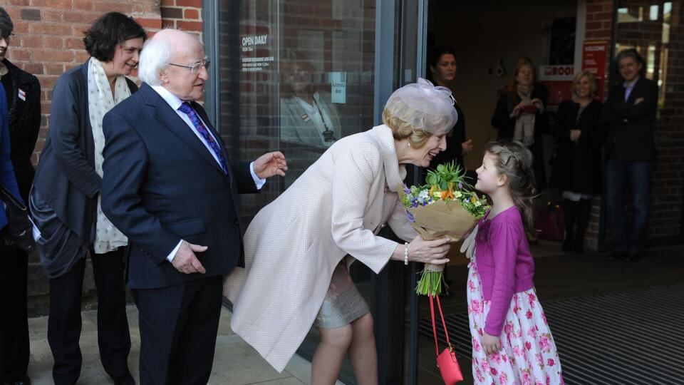 Martha Wainwright (6) presents flowers to President Michael D. Higgins and his wife Sabina during a visit to the Royal Shakespeare Company in Statford-upon-Avon. Photograph: PA