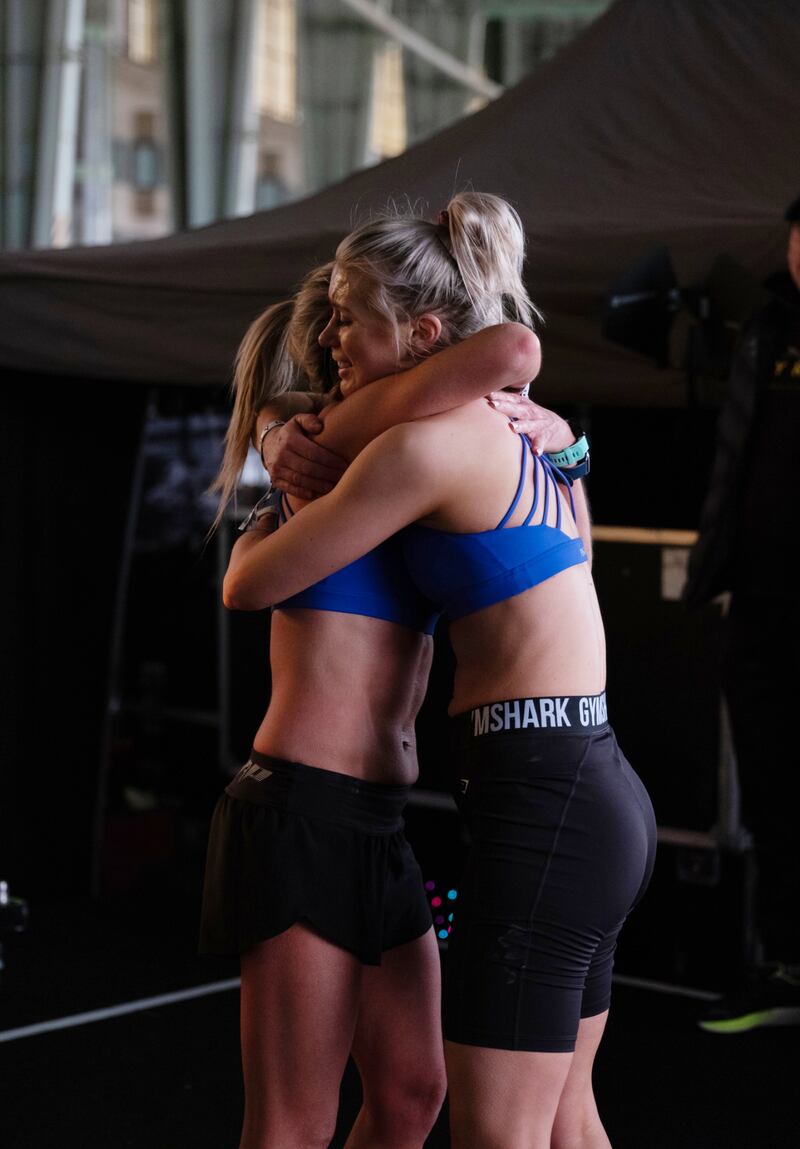 Competitors during a Hyrox event in Berlin. Hyrox races combine running with several functional fitness movements, such as the farmer’s carry, the weighted lunge, and the burpee broad jump. Photograph: Maria Sturm/The New York Times