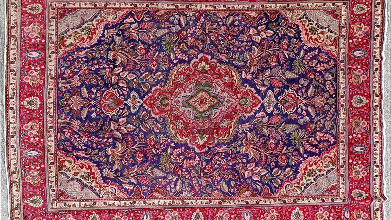 Vintage, hand knotted Tabriz Persian rug with a floral and foliage pattern