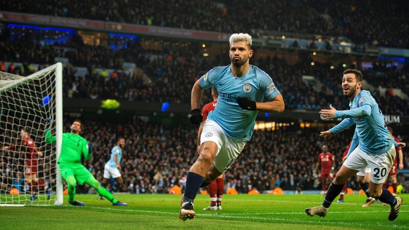 Manchester City’s Sergio Agüero celebrates scoring the opening goal during the Premier League match against Liverpool at the Etihad Stadium. Photograph: Peter Powell/EPA