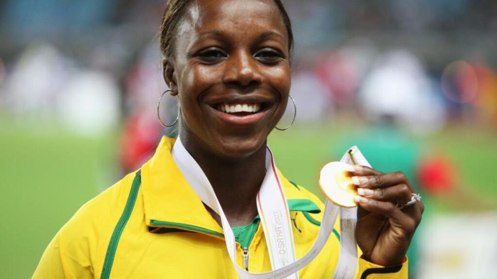 World 200m champion, sprinter Veronica Campbell-Brown of Jamaica has tested positive for a banned diuretic and faces a two year ban from athletics competition. FILE - JUNE 16, 2013: World 200m champion, sprinter Veronica Campbell-Brown of Jamaica has tested positive for a banned diuretic and faces a two year ban from athletics competition OSAKA, JAPAN - AUGUST 28: Gold medalist Veronica Campbell of Jamaica shows off her gold medal from the Women’s 100m on day four of the 11th IAAF World Athletics Championships on August 28, 2007 at the Nagai Stadium in Osaka, Japan. (Photo by Andy Lyons/Getty Images)