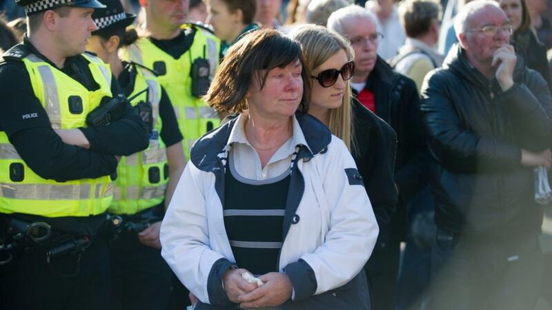 Marian Buckley (centre front), the mother of Karen Buckley, is comforted as she joins hundreds of mourners at a vigil for her daughter in George Square, Glasgow. Photograph: Jane Barlow/PA Wire.