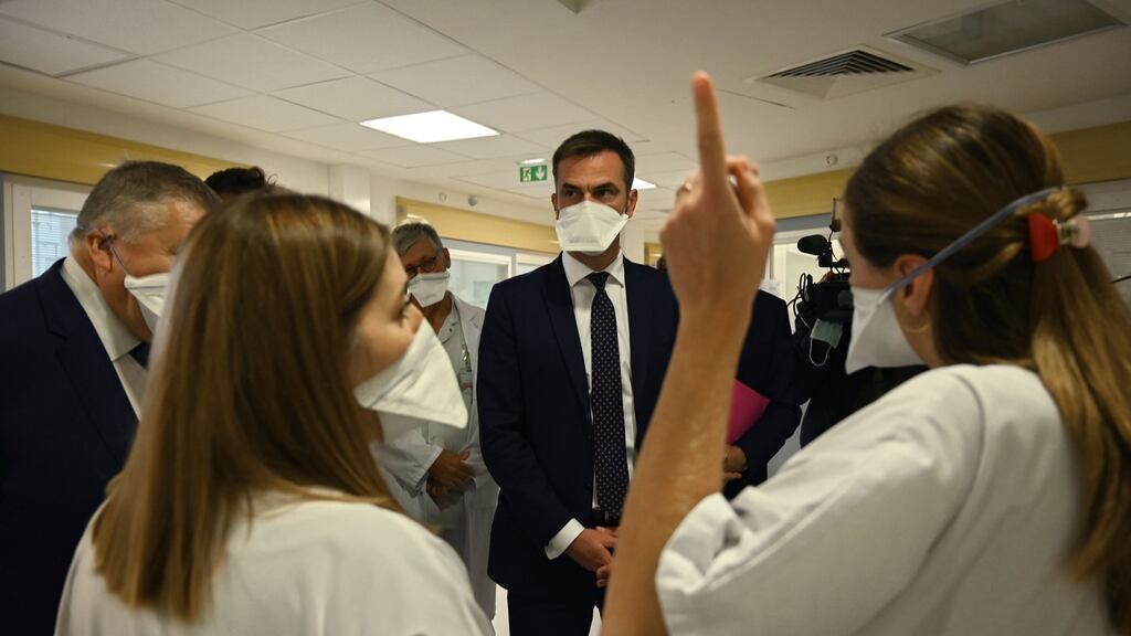French health minister Olivier Veran speaks with health workers of La Timone public hospital in Marseille. Photograph: Christophe Simon/AFP via Getty