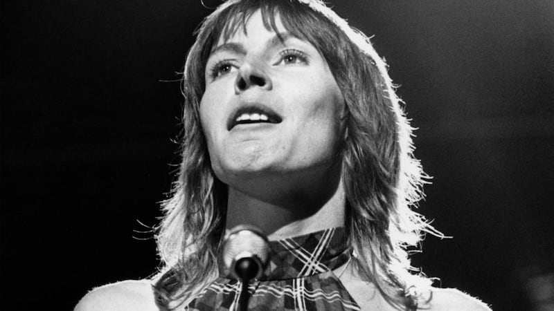Helen Reddy performing on stage. She was dubbed the ‘queen of ’70s pop’. Photograph: Tony Russell/Redferns