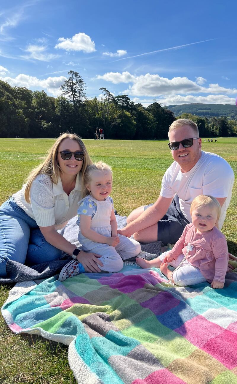 Lucy Barrett with daughters Lola (three) and Molly (nine months) and partner Yannick. Photograph: Lucy Barrett