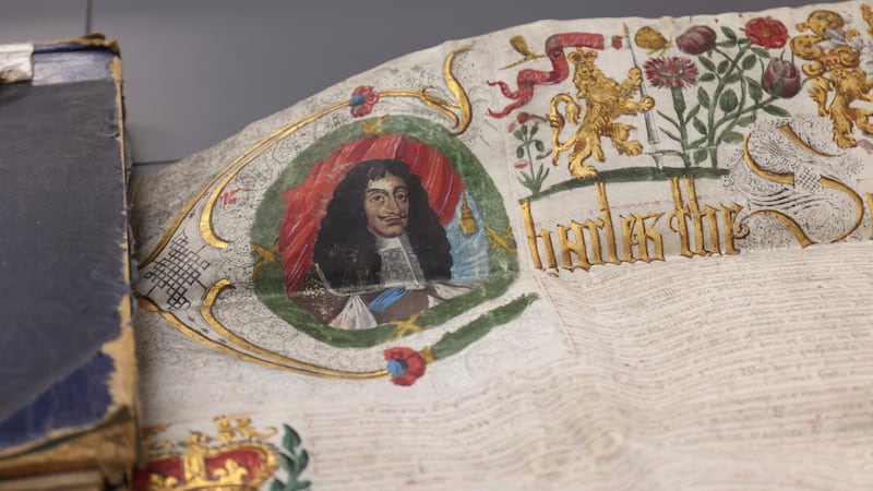 Detail from the vellum charter shown by Conor Gallagher includes a picture of King Charles II. Photograph: Bryan O’Brien