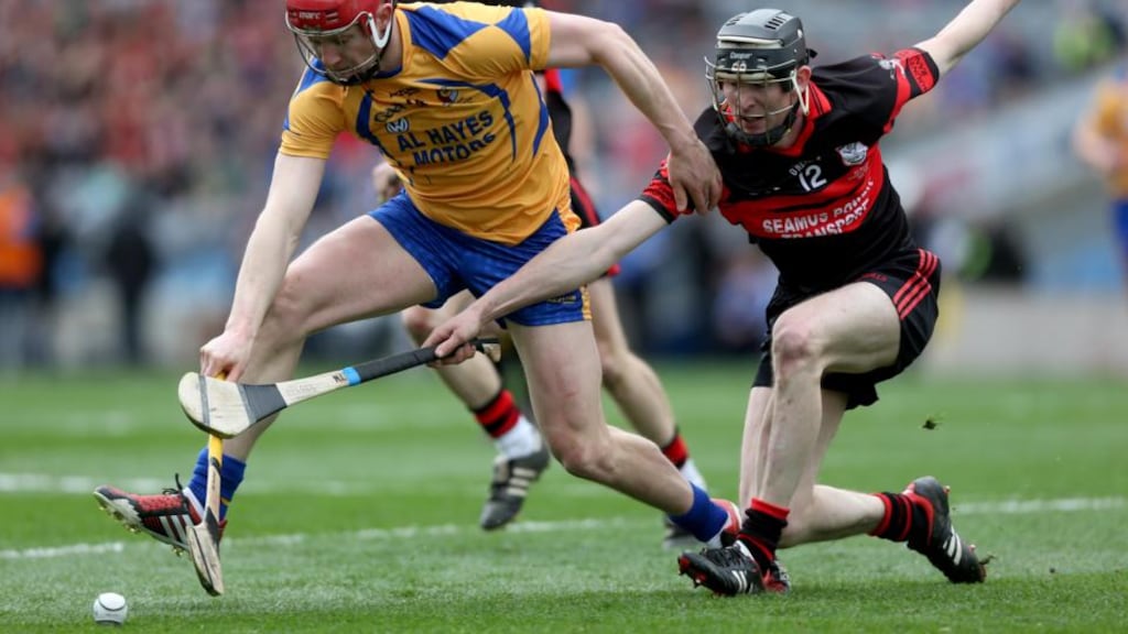 Portumna’s Joe Canning and David Phelan of Mount Leinster during yesterday’s All-Ireland senior club final at Croke Park. Photograph: Donall Farmer/Inpho