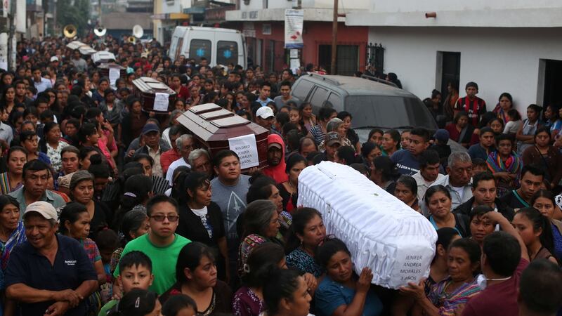 Mourners take part in the funeral of seven victims who died during the eruption of the Fuego volcano in Alotenango, Guatemala on June 4th, 2018. Photograph: REUTERS/Jose Cabezas