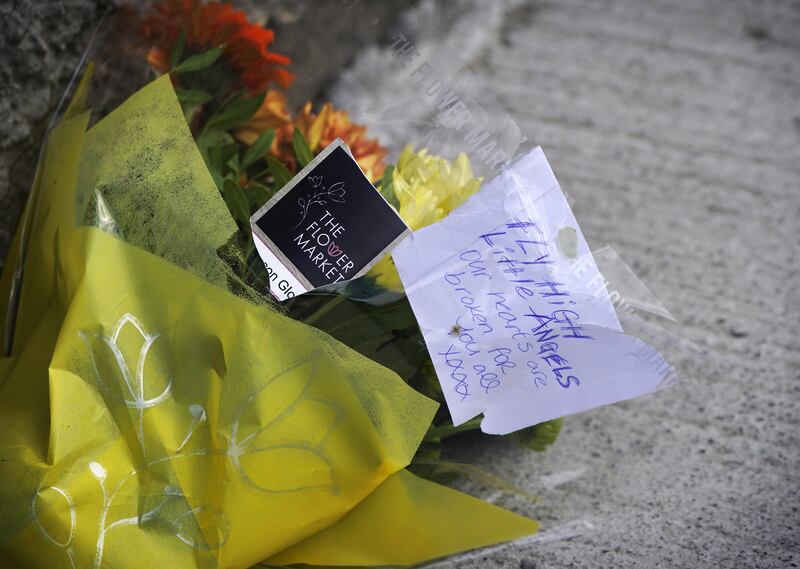 Flowers at the scene in the Rossfield Estate in Tallaght, Dublin. Photograph: Niall Carson/PA