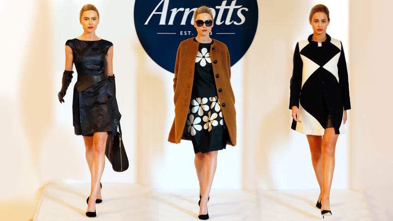 On the catwalk - Left: Raoul Francis Belted Dress, €400; Gala Leather Gloves, €160;Pour la Victoire Yves Tote, €435. Middle: Orla Kiely Camel Coat, €360; Marble Top, €280; Skirt, €260. Right: Raoul Ivory/black dress, €450; Raoul Ivory/black Coat €655