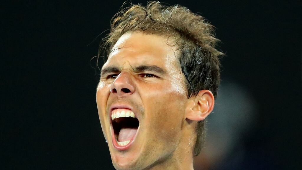 Rafael Nadal celebrates after clinching victory against   Milos Raonic in the  Australian Open quarter-final at Melbourne Park. Photograph:  Scott Barbour/Getty Images
