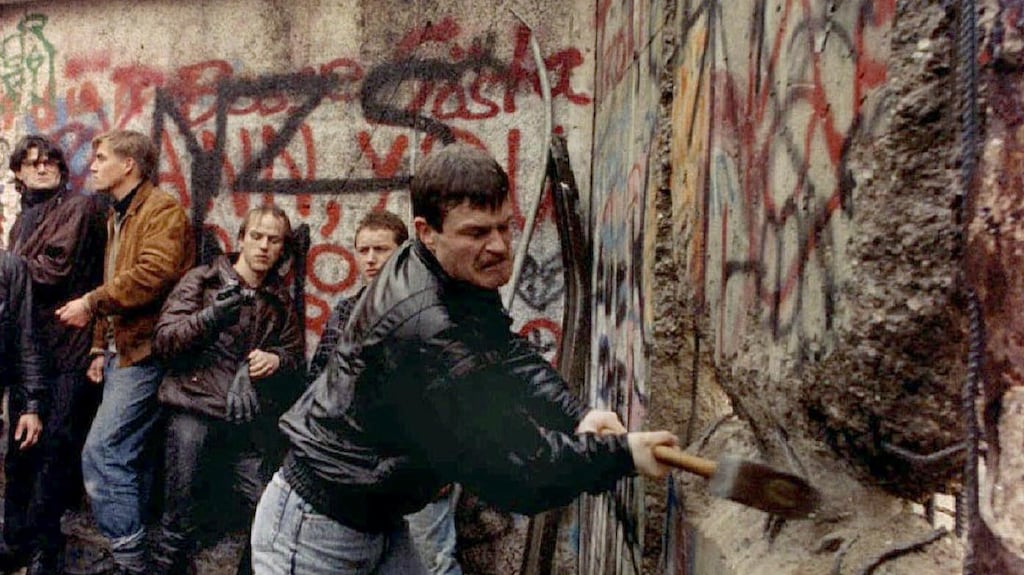 Breaking down the Berlin Wall. Its fall initiated a major transformation in the wider European economy whose effects played out over the subsequent 25 years. Photograph: David Brauchli/Reuters