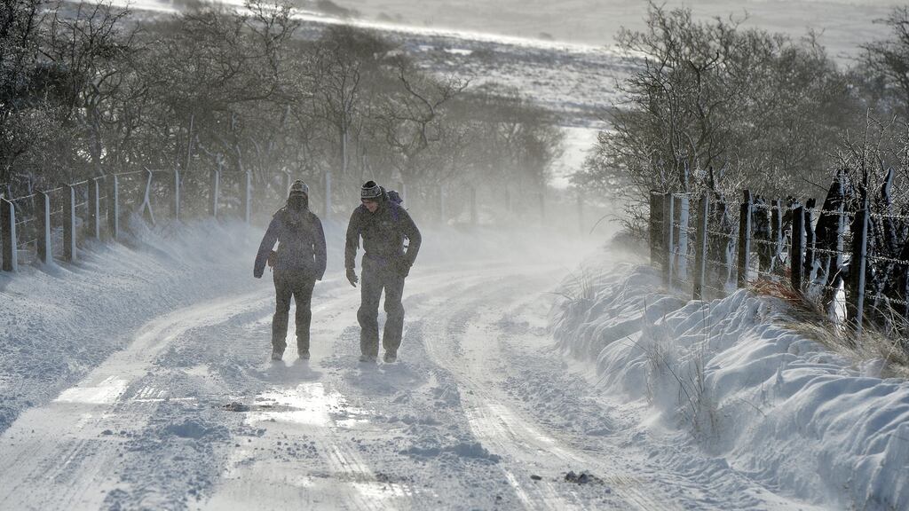 Walking in adverse weather “If you or one of your party is cold the best remedy is to eat something sugary and get moving. Warm drinks are helpful, but to stay warm you must keep moving.” Photograph: Getty Images