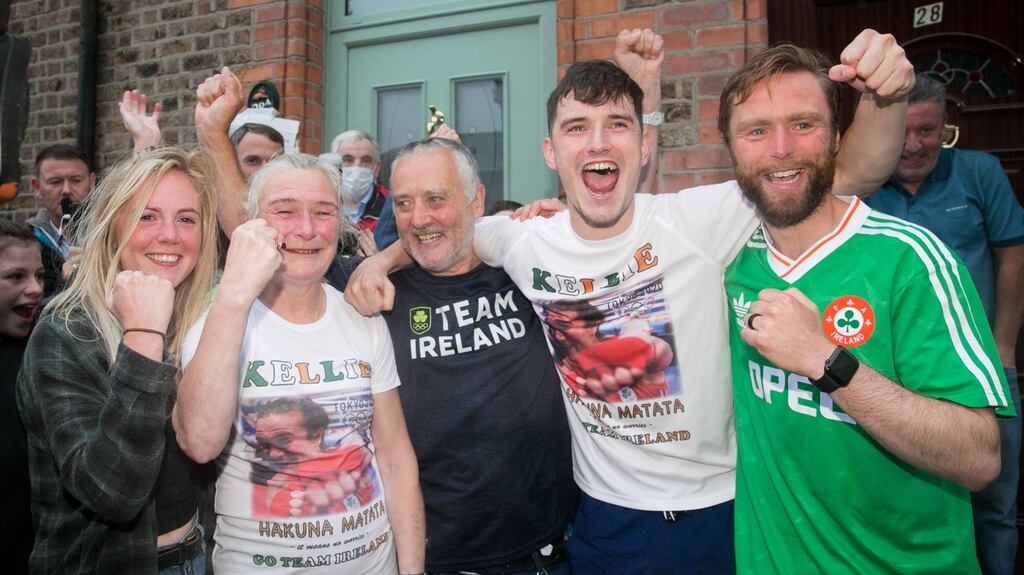 Kellie Harrington’s partner Mandy with Harrington’s mother Yvonne, father Christy and brothers Joel and Christopher on Portland Row after the Olympic final. Photo: Gareth Chaney/Collins