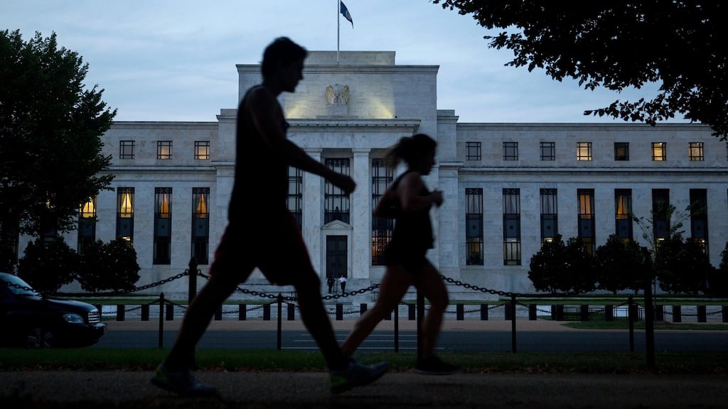 The Federal Reserve: the IMF urged it to wait until next year to raise rates for the first time in almost a decade