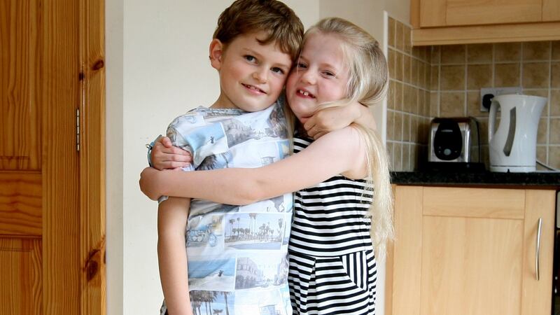Ethan and Autumn Hurl: “When I say ‘what’s rare is not always beautiful’, that is no reflection on our two beautiful children, it’s a reflection on these rare conditions that make their little lives more difficult and have robbed some of their childhood,” says their mother. Photograph: Brian Farrell