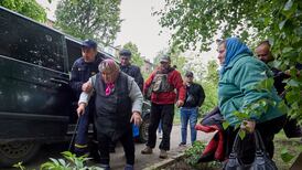 Ukraine says Russian attackers ‘blocked’ in Kharkiv region as evacuations continue