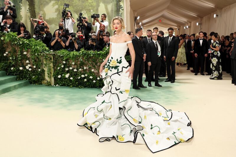Gigi Hadid wore a corseted, off-the-shoulder, floral appliqué gown by Thom Browne. Photograph: Dia Dipasupil/Getty Images