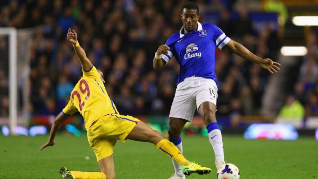 Everton’s Sylvain Distin marshalls Marouane Chamakh of Crystal Palace during the Barclays Premier League match between Everton and Crystal Palace at Goodison Park. Photograph: Clive Brunskill/Getty Images