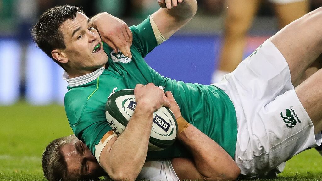 Johnny Sexton is tackled by England’s Owen Farrell at the Aviva Stadium. Photograph: Billy Stickland/Inpho