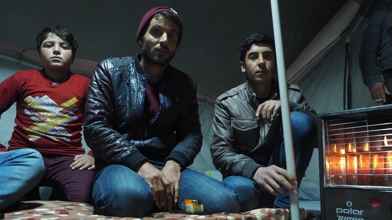 Moussa (35) is visiting his nephews, Salah (14) and Yusef (15), at Bardarash refugee camp. Photograph: Lorraine Mallinder