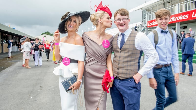 Photobombed: passersby jump in to a photograph of Mary Lee, left, and Katie Geoghegan. Photograph: Brenda Fitzsimons