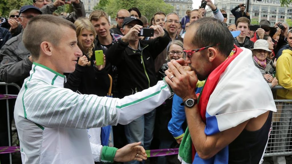 Ireland’s Rob Heffernan congratulates the winner of the men’s 50k race walk, France’s Yohann Diniz at the European Athletics Championships at Letzigrund Stadium, Zurich. Photograph: Inpho
