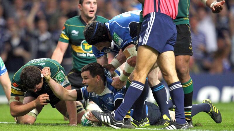 Leinster’s Jonathan Sexton is congratulated by Shane Jennings after going over for a try during Leinster’s 2011 Heineken Cup victory over Northampton. Photograph: Billy Stickland/Inpho