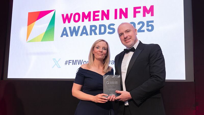 Derek O'Boyle, managing director, MKF Property Services, presents the rising star of the year award to Helen McManus, Riverside Maintenance