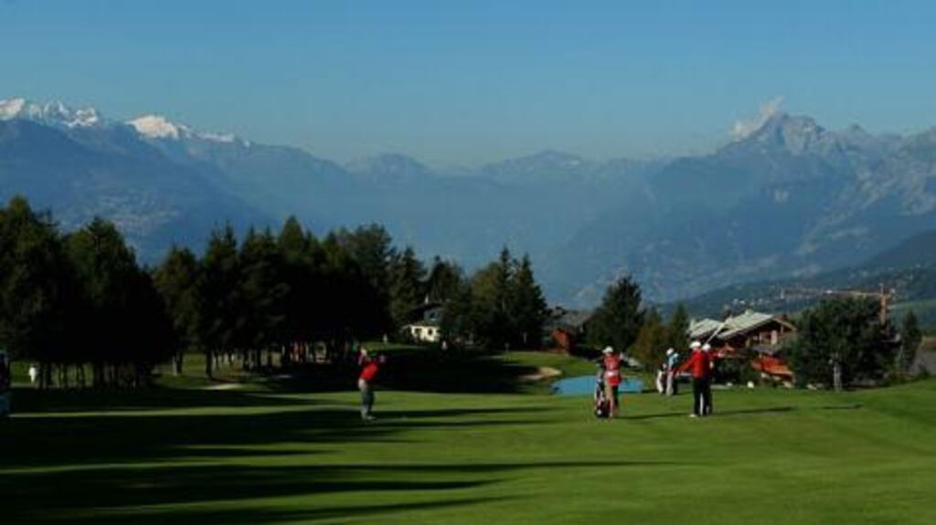 Edoardo Molinari plays his approach shot to the 14th green during the second round of the European Masters this morning. Photograph: Warren Little/Getty Images