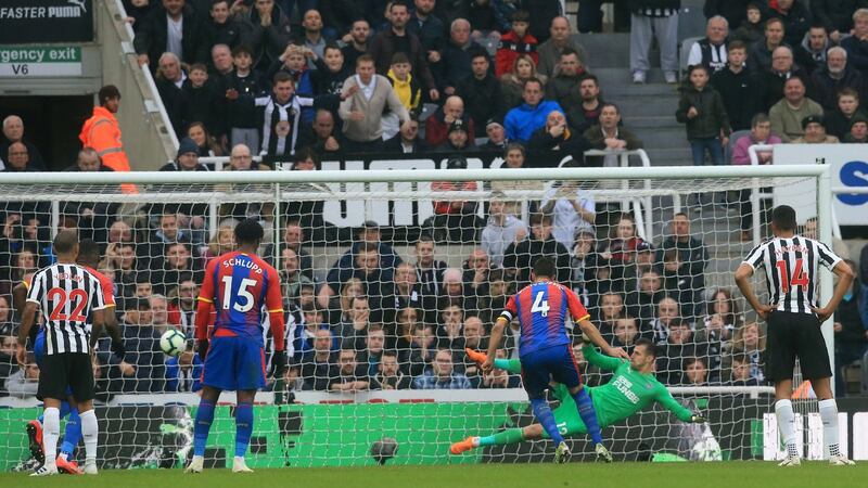 Luka Milivojevic scores from a penalty at St James’ Park. Photograph: Getty Images