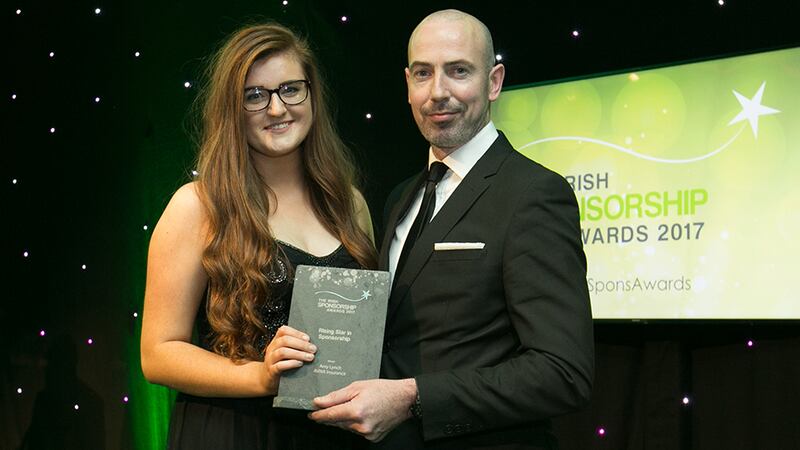 Sean McAuliffe, Co-Founder & Director, Sport Collective (UK), presents the Rising Star in Sponsorship award to Amy Lynch, AVIVA Insurance.