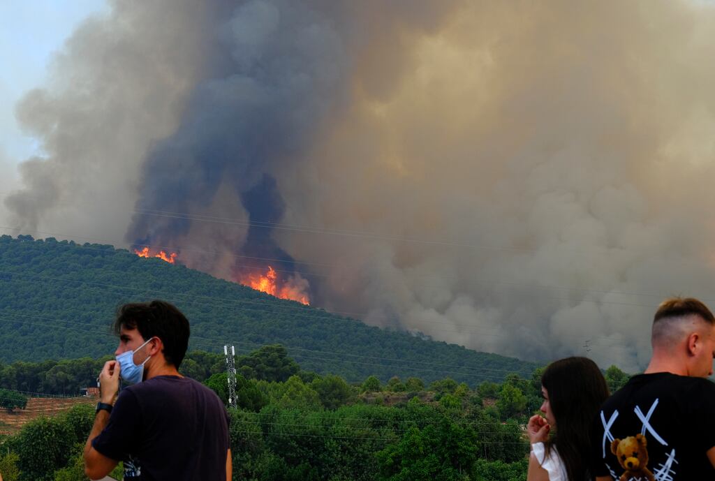 Wildfire advances near a residential area in Alhaurin de la Torre, Malaga, Spain. Photograph: Gregorio Marrero/AP Photo