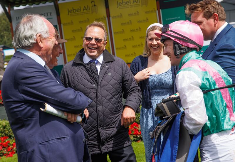 Trainer Ger Lyons and jockey Colin Keane share a joke with the winning connections after Babouche's win in the Anglesey Stakes at the Curragh. Photograph: Tom Maher/Inpho