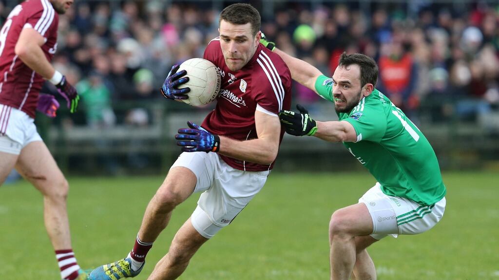 Galway’s Fiontán Ó Curraoin and Paul McCusker of Fermanagh. Photograph: Andrew Paton/Inpho