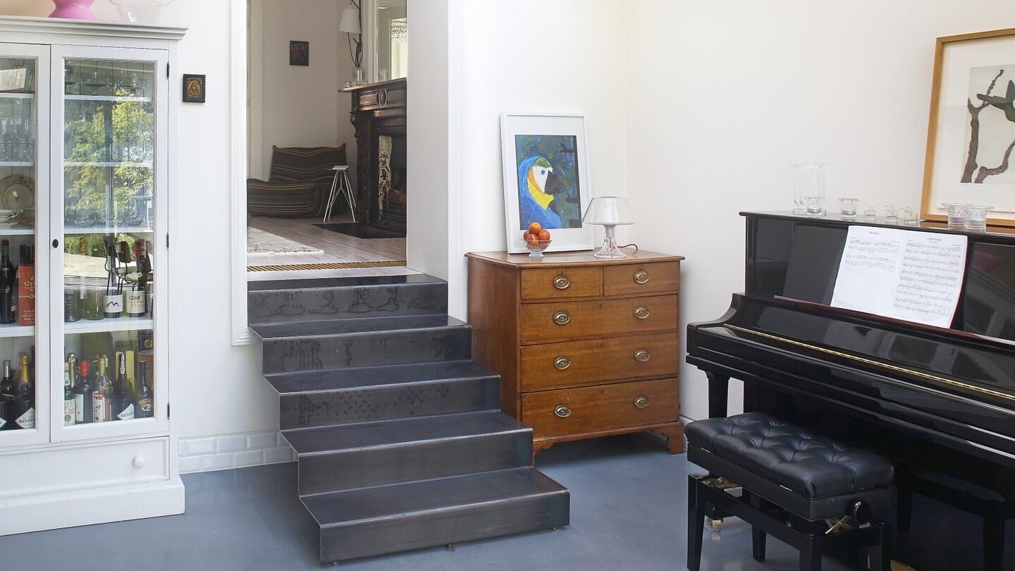 Steps down to the kitchen/dining area.