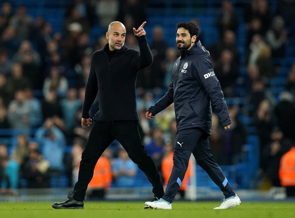 Pep Guardiola with Ilkay Gundogan: 'We have just two games at home – Leeds and Chelsea – and we need our people.' Photograph: Martin Rickett/PA Wire