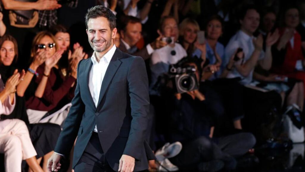US designer Marc Jacobs at the end of his spring/summer 2014 women’s ready-to-wear fashion show for French fashion house Louis Vuitton during Paris fashion week. The star designer is leaving Louis Vuitton as artistic director, a source close to the French fashion brand’s parent LVMH said. Photograph: Benoit Tessier/Reuters
