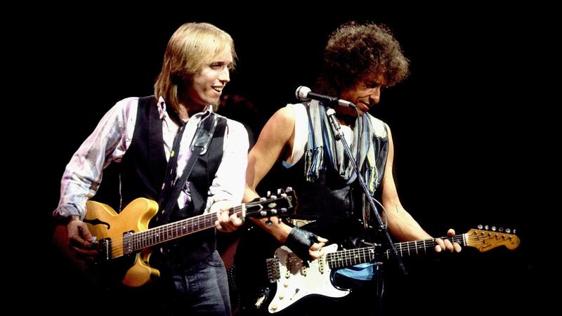 Tom Petty and Bob Dylan in concert in Chicago in 1986. Photograph: Paul Natkin/WireImage/Getty Images