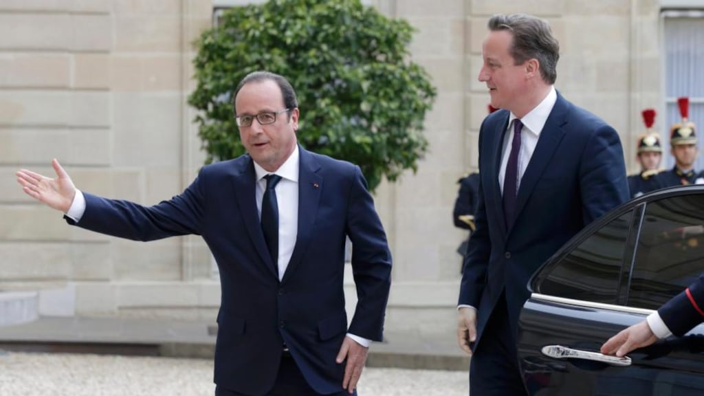 David Cameron being greeted by French president François Hollande at the Élysée Palace yesterday. Mr Cameron also met Dutch prime minister Mark Rutte. Photograph: Philippe Wojzaer/Reuters
