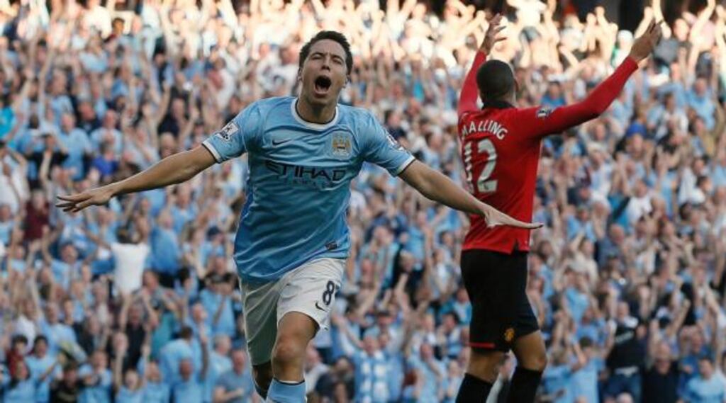 Manchester City’s Samir Nasri celebrates scoring the fourth against Manchester United. Photograph: Phil Noble/Reuters