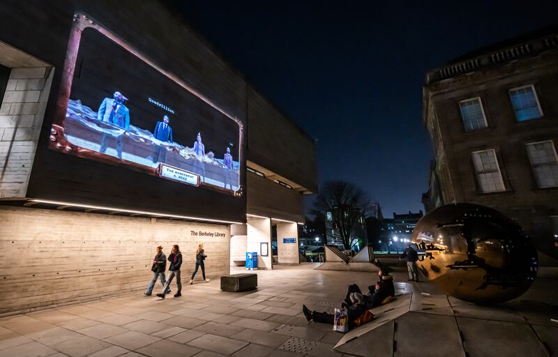 Irish National Opera is screening the Scorched Earth Trilogy on the side of the Berkeley Library at Trinity College Dublin for Culture Night. Photograph: Neil Harrison