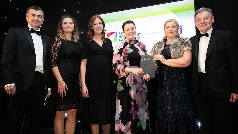 Aine Mulcahy, Managing Director, OCS Group Ireland presents the Property Management Team of the Year award to the Wyse Team.