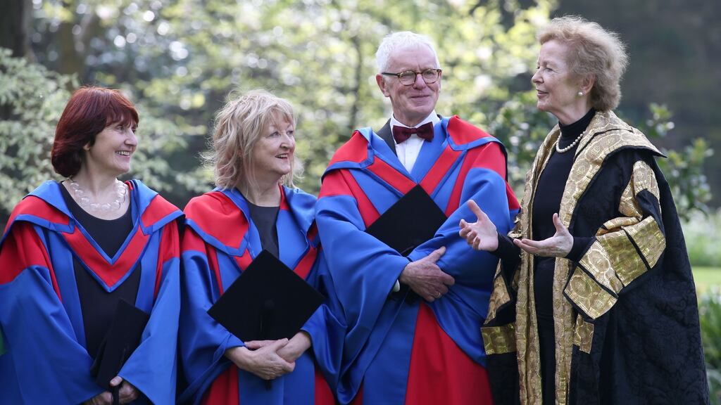 Chancellor of Trinity College Dublin, Mary Robinson (right) chats with honorary degree recipients (from left) architects Shelley McNamara and Yvonne Farrell and Professor Cormac Ó Gráda at the conferring ceremony. Photograph: Laura Hutton/The Irish Times