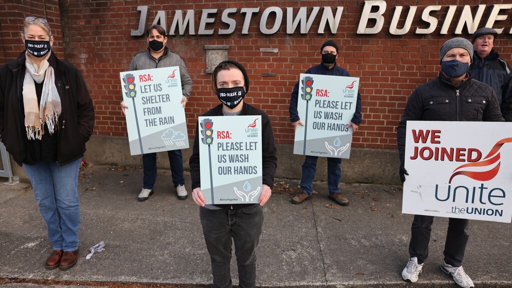 Driving instructors linked to Unite trade union protest outside the Road Safety Authority on Jamestown Road in Finglas on Thursday. Photograph: Dara Mac Donaill