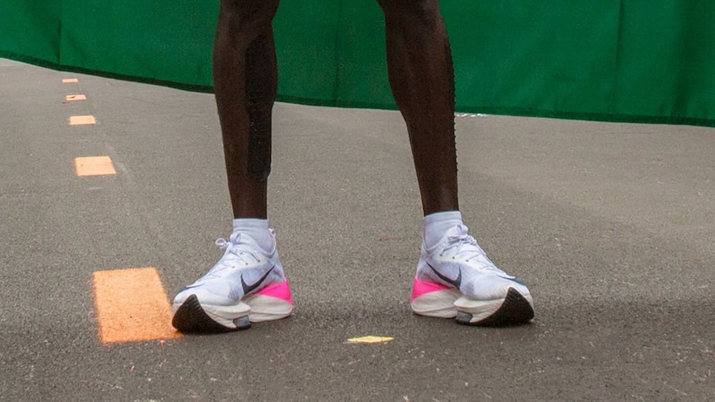 File photograph shows the running shoes of Kenya’s Eliud Kipchoge as he stands after his attempt to break the two-hour barrier for the marathon at The Reichsbrücke in Vienna last October. Photo: Alex Halada/AFP via Getty Images