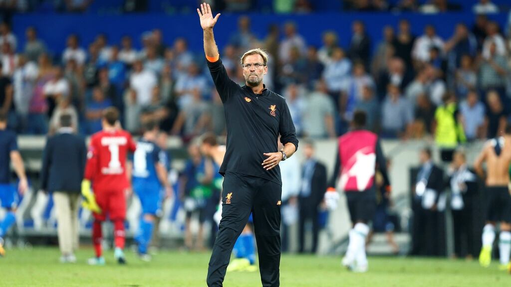 Liverpool manager Jurgen Klopp thanks the away fans after his team’s win in Germany. Photograph: Reuters